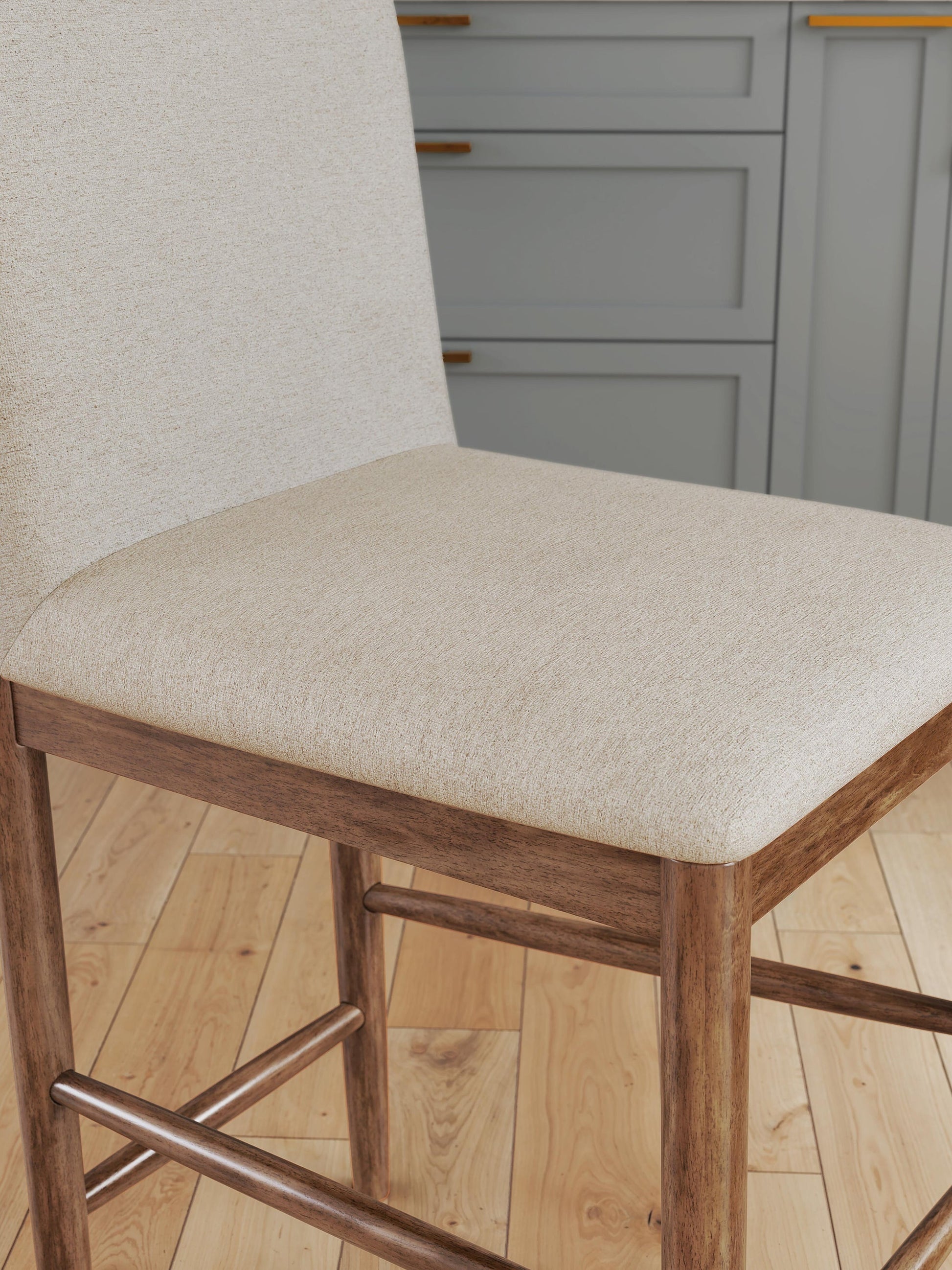 Isanti Upholstered Barstool (2/CN) Millennium® by Ashley