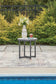 Ocean Beach Round End Table Signature Design by Ashley®