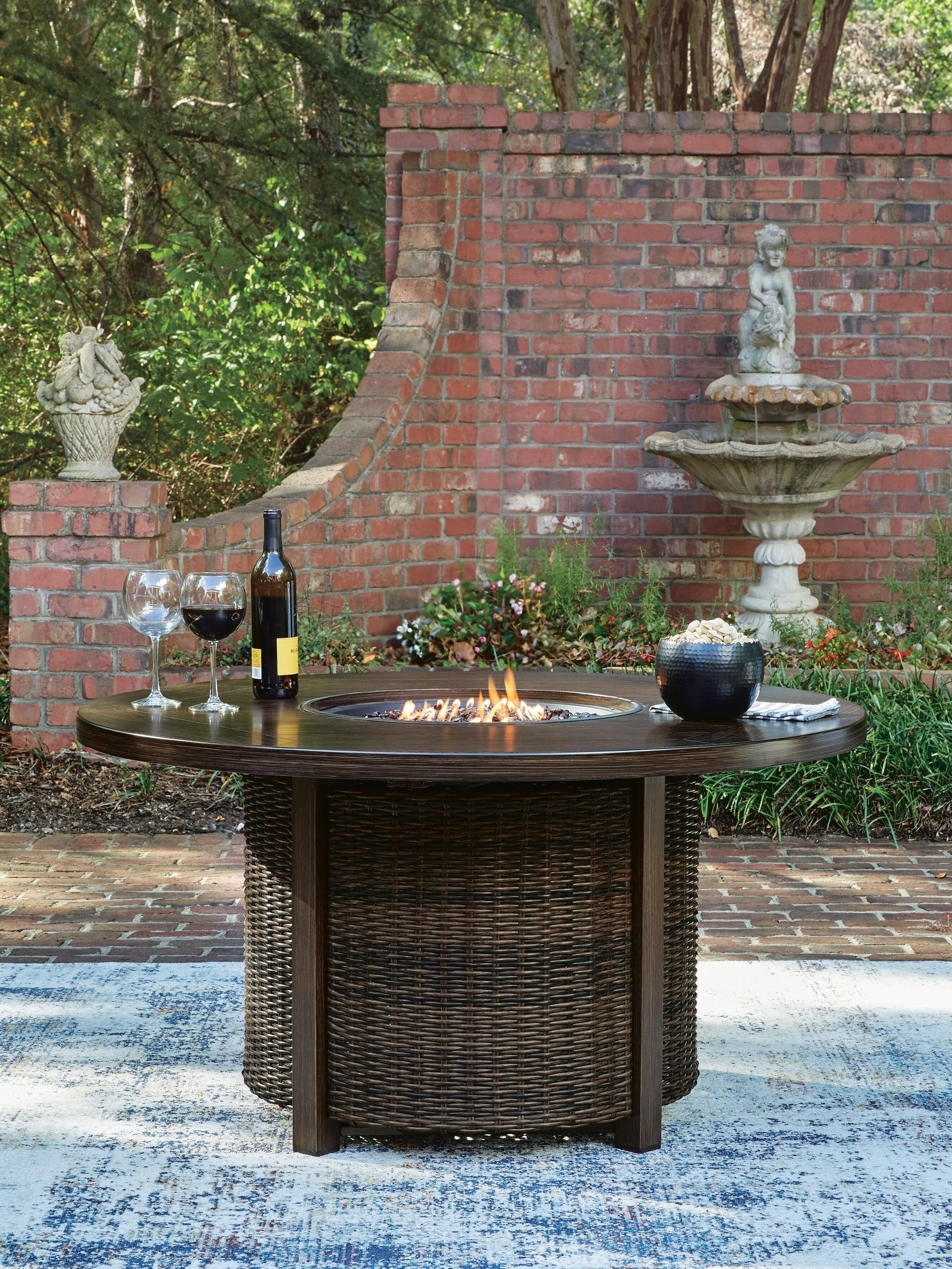 Monterey Point Round Fire Pit Table Signature Design by Ashley®