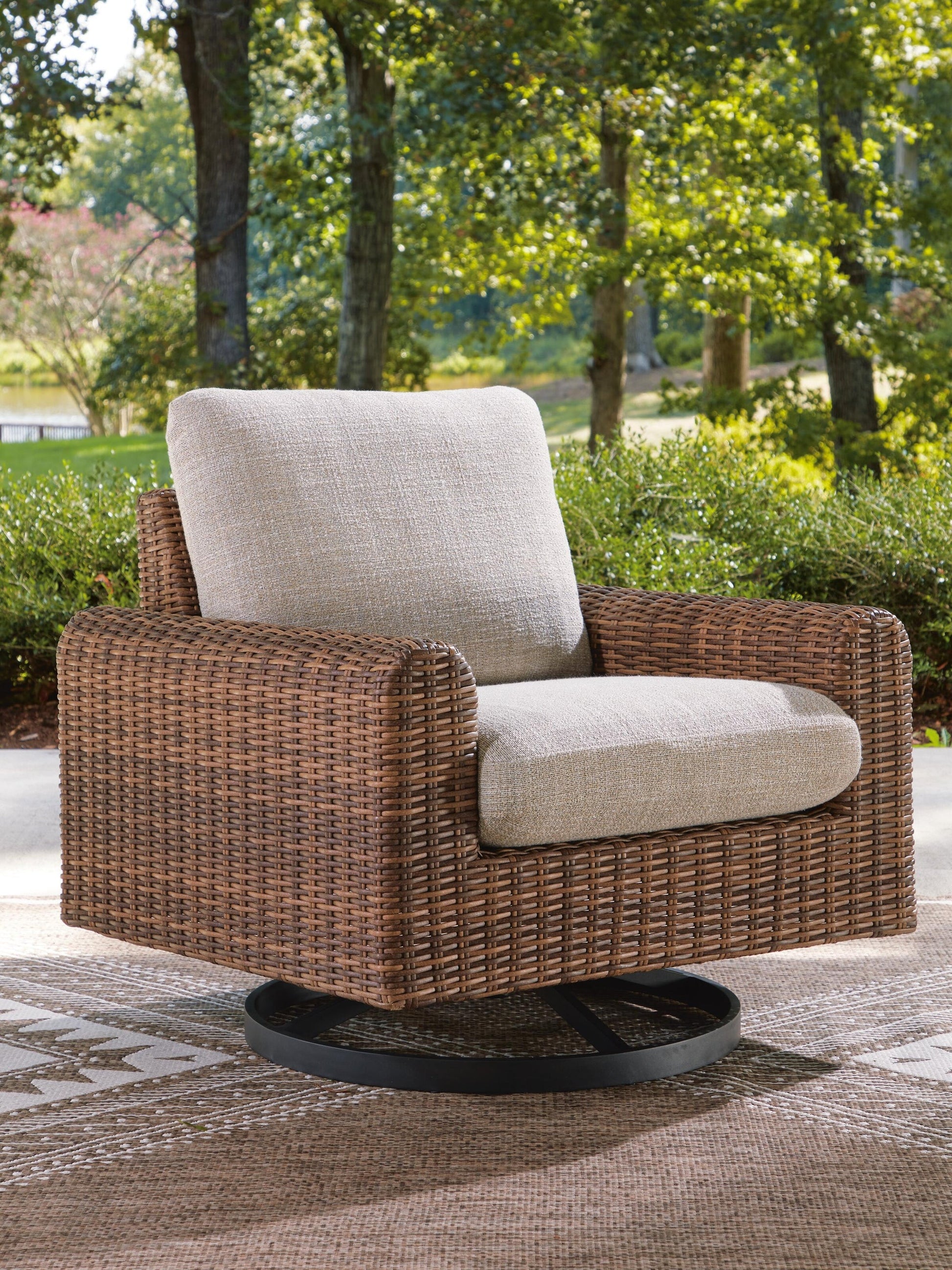 Dolan Creek Swivel Lounge w/ Cushion Signature Design by Ashley®