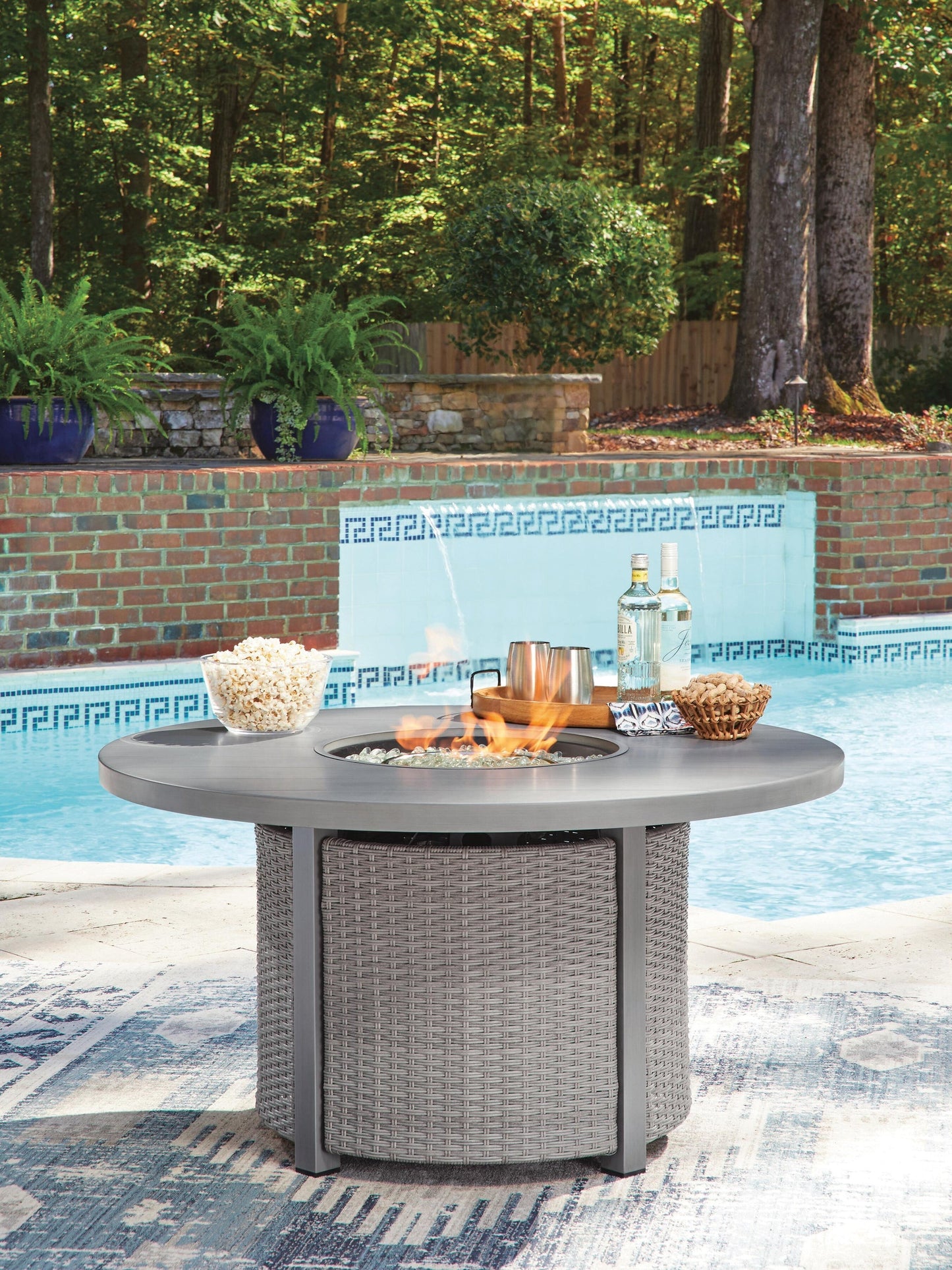 Half Moon Beach Round Fire Pit Table Signature Design by Ashley®