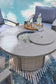 Half Moon Beach Round Fire Pit Table Signature Design by Ashley®