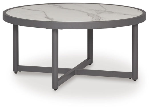 Ocean Beach Round Cocktail Table Signature Design by Ashley®