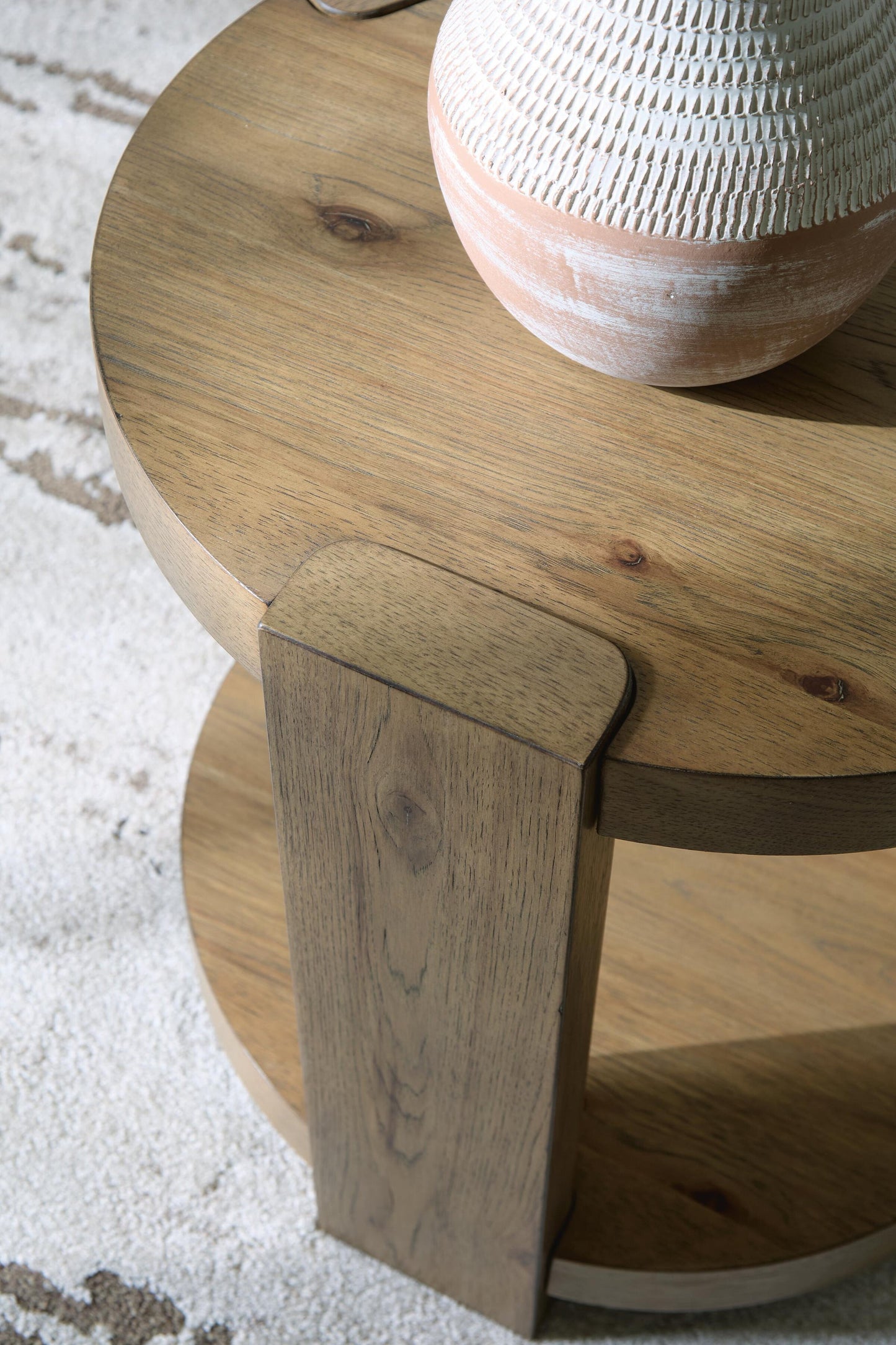 Flangren Round End Table Signature Design by Ashley®