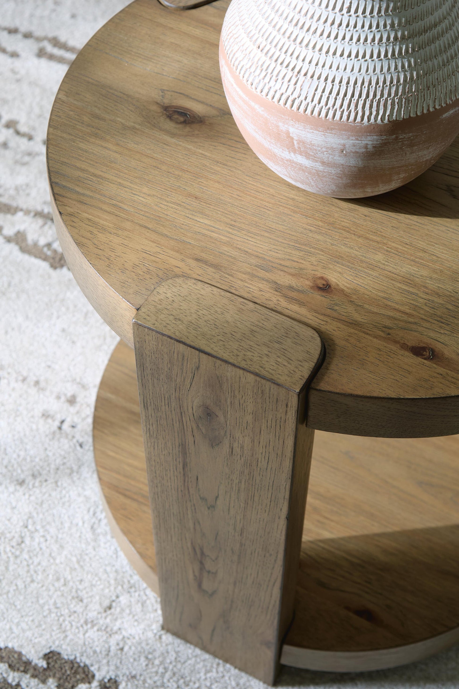 Flangren Round End Table Signature Design by Ashley®