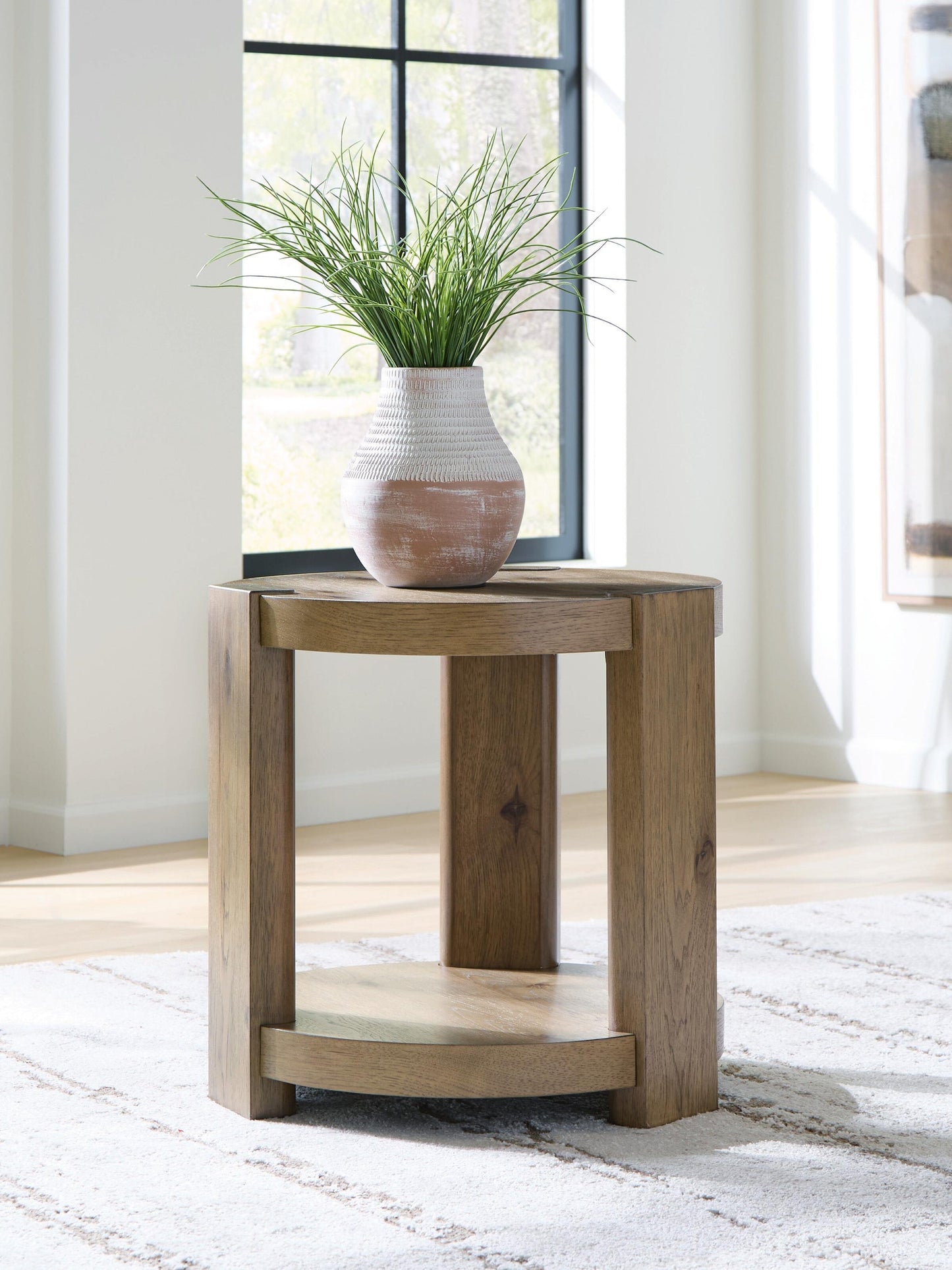 Flangren Round End Table Signature Design by Ashley®