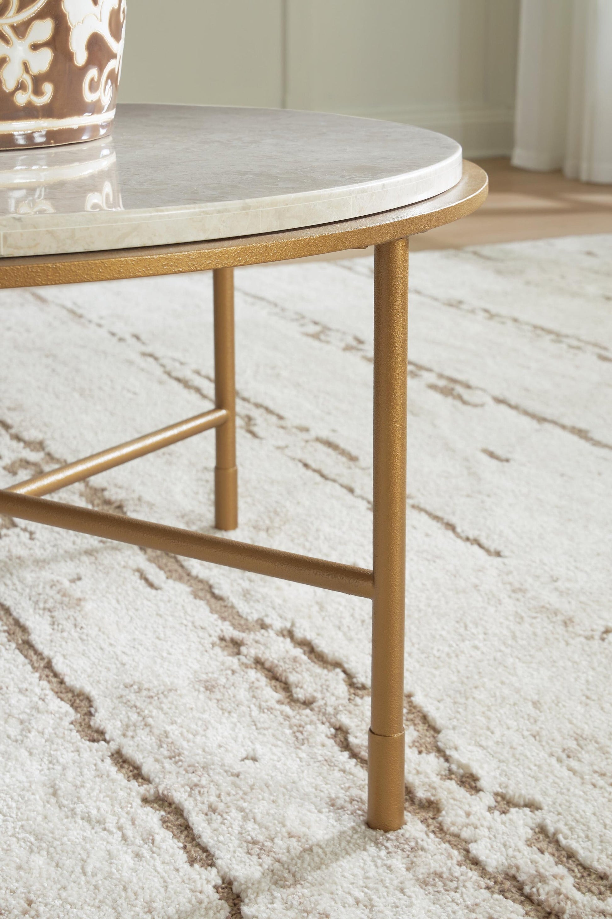 Alben Round Cocktail Table Signature Design by Ashley®