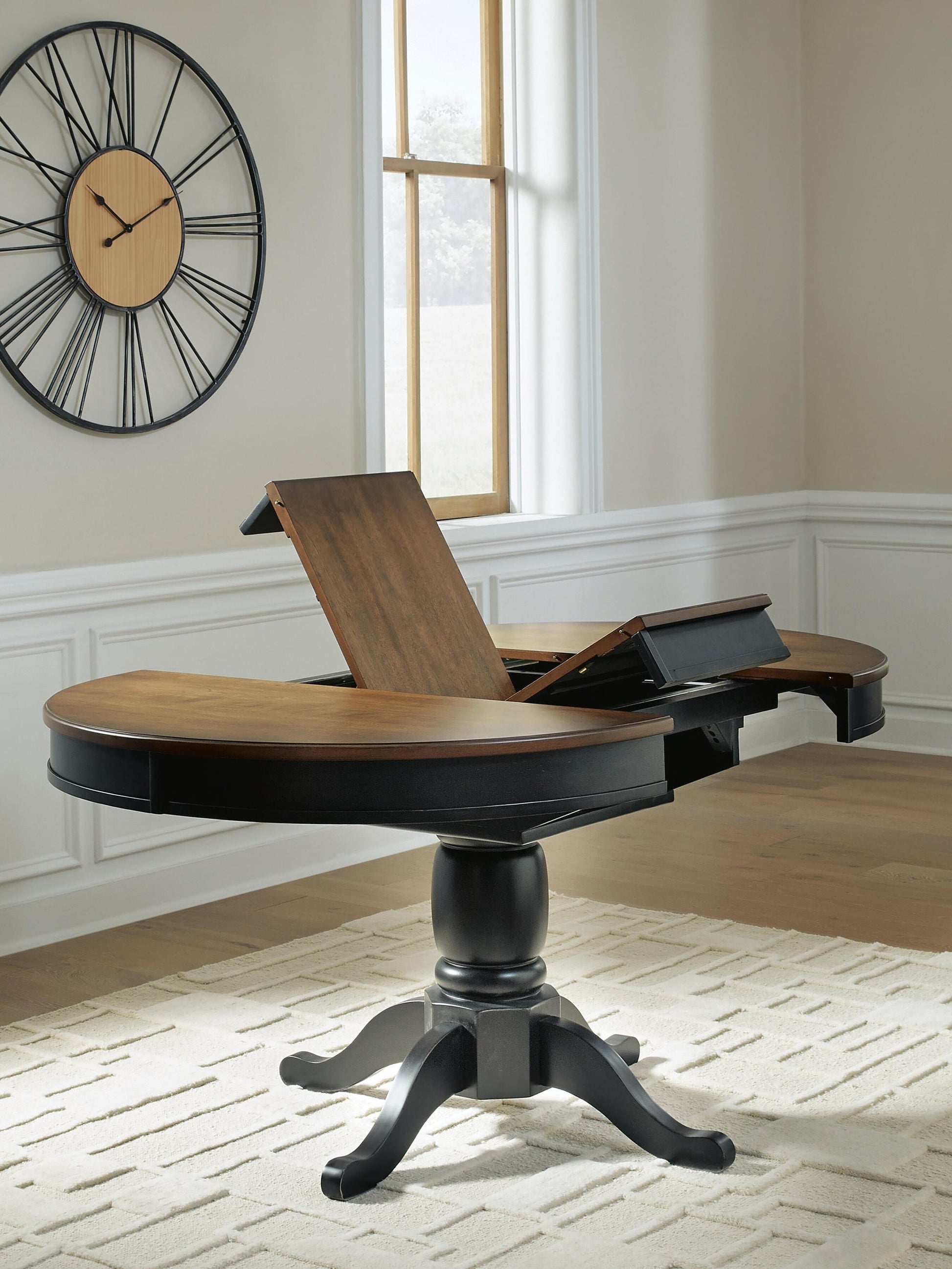 Clorazi Oval DRM Butterfly EXT Table Signature Design by Ashley®