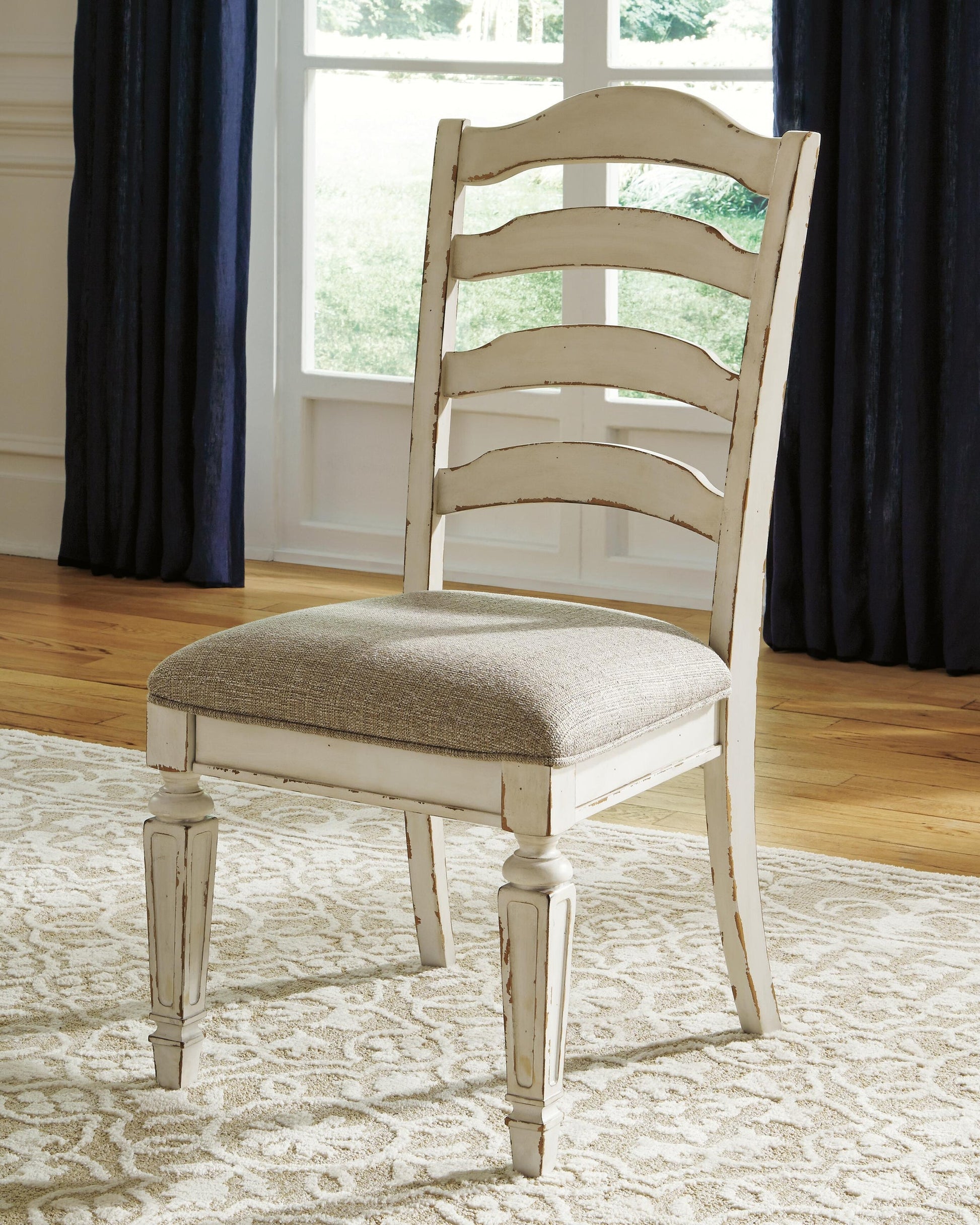 Realyn Dining Table and 4 Chairs Signature Design by Ashley®