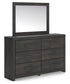 Delmorta  Panel Bed, Dresser, Mirror And Nightstand Signature Design by Ashley®