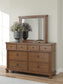 Chadworth  Poster Bed With Mirrored Dresser And Nightstand Signature Design by Ashley®