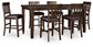 Haddigan Counter Height Dining Table and 6 Barstools Signature Design by Ashley®