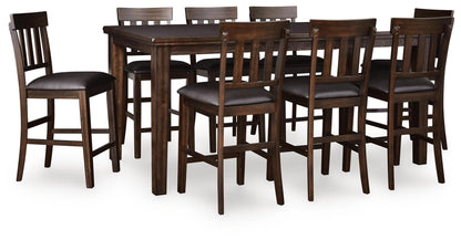 Haddigan Counter Height Dining Table and 8 Barstools Signature Design by Ashley®