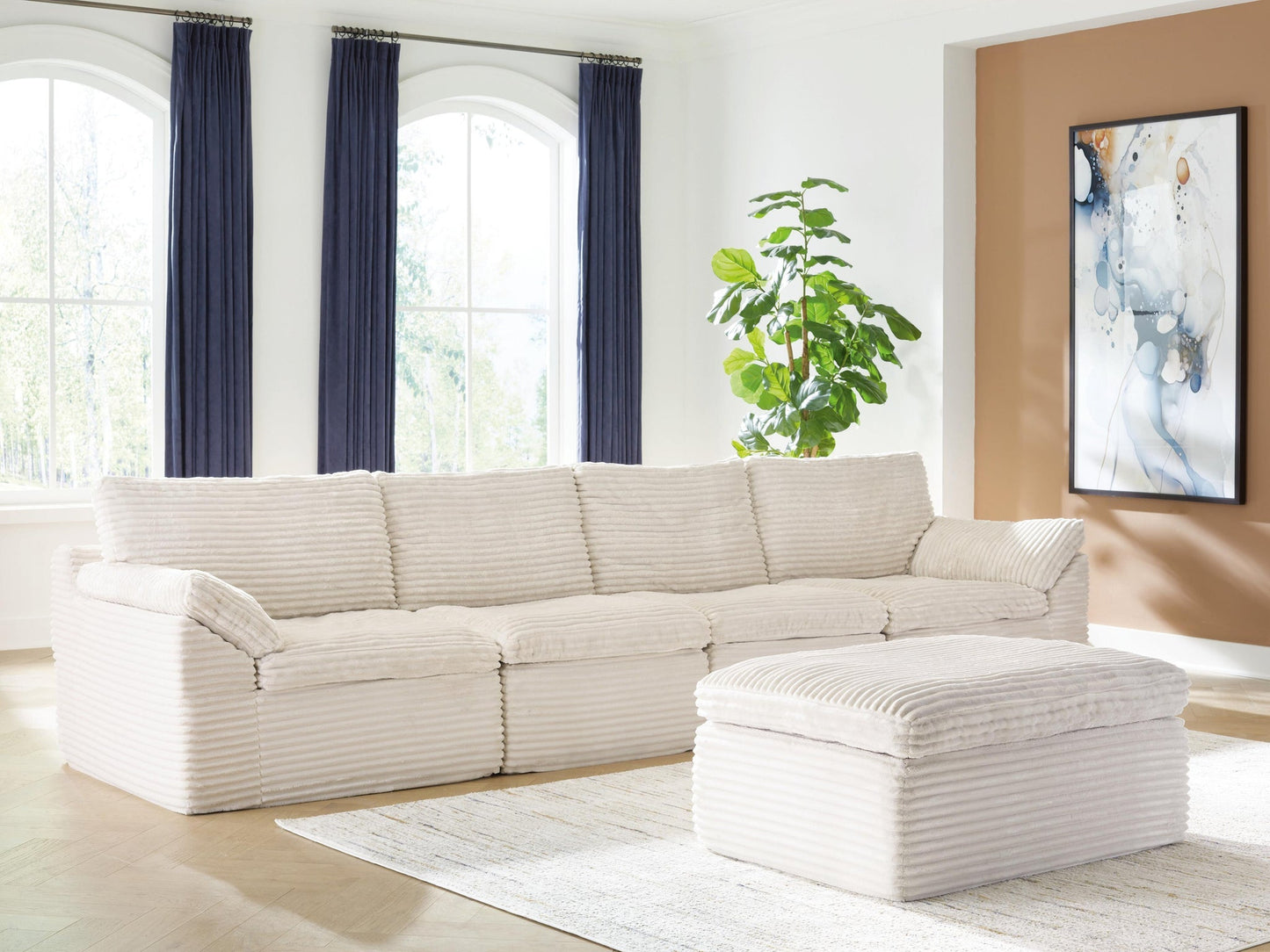 Fannin 4-Piece Sectional with Ottoman Signature Design by Ashley®