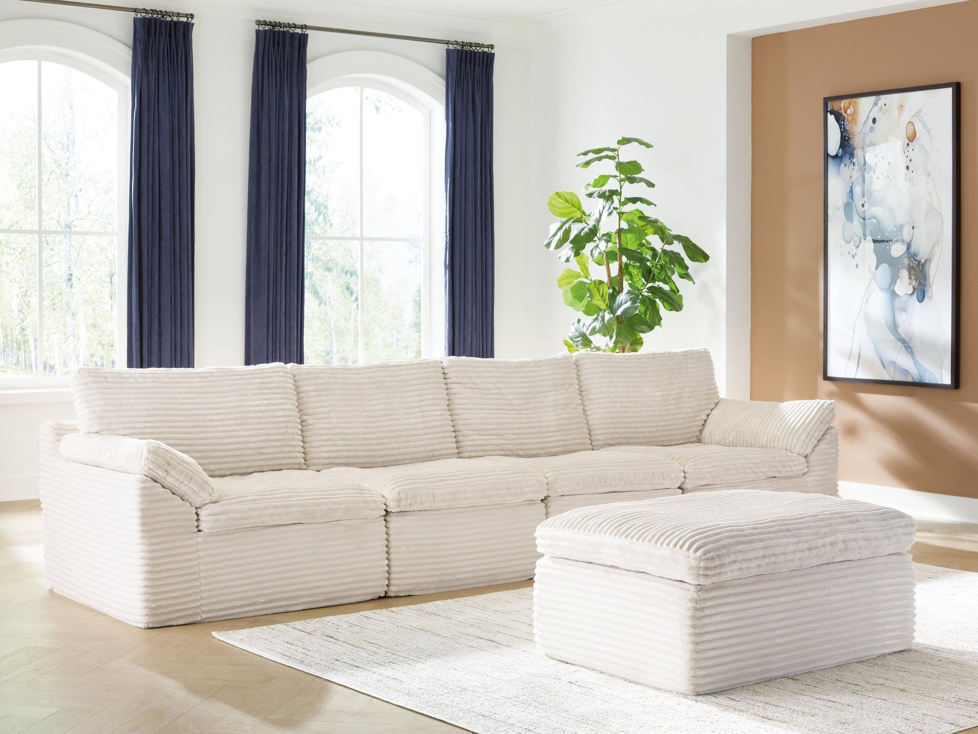Fannin 4-Piece Sectional with Ottoman Signature Design by Ashley®