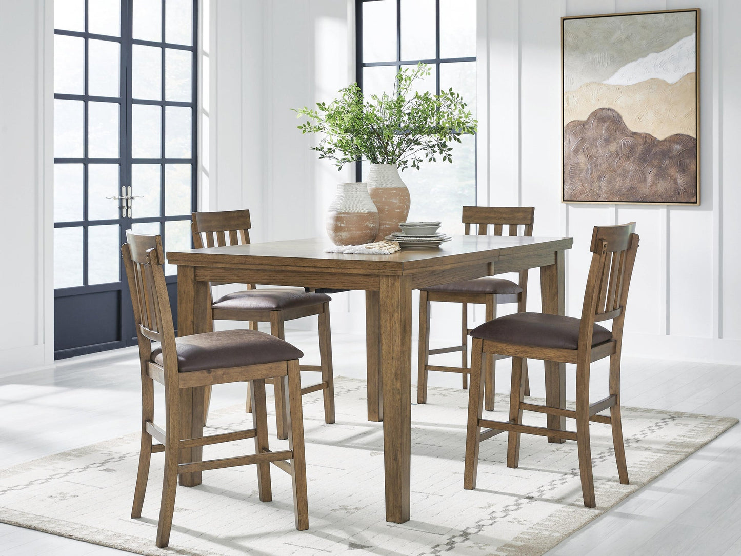 Broxtyn Counter Height Dining Table and 4 Barstools Signature Design by Ashley®