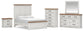 Savonport  Panel Bed, Dresser, Mirror, Chest And Nightstand Benchcraft®