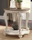 Realyn Round End Table Signature Design by Ashley®
