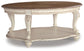 Realyn Oval Cocktail Table Signature Design by Ashley®