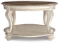 Realyn Oval Cocktail Table Signature Design by Ashley®
