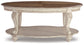 Realyn Oval Cocktail Table Signature Design by Ashley®