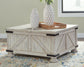 Carynhurst Cocktail Table with Storage Signature Design by Ashley®