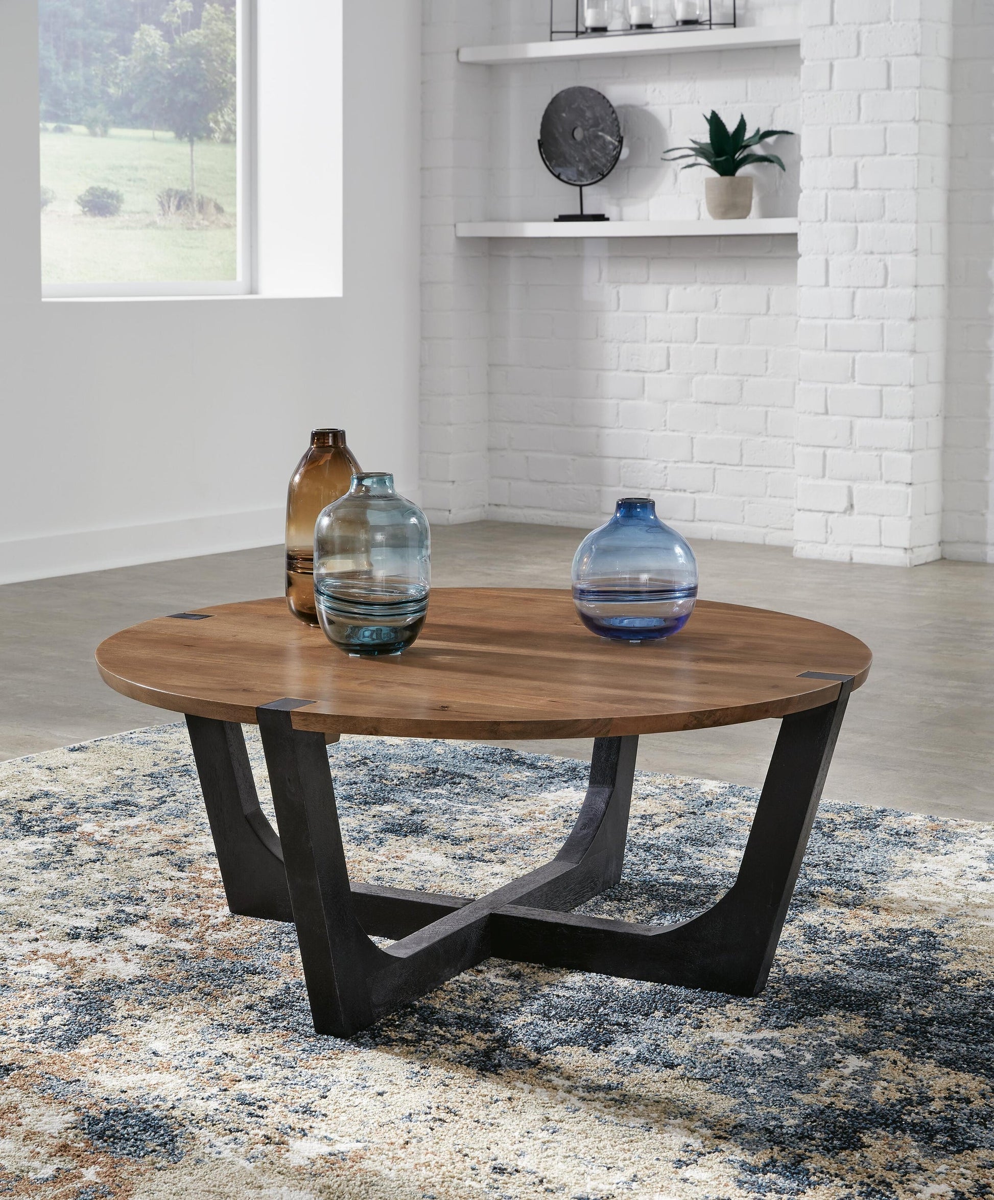 Hanneforth Round Cocktail Table Signature Design by Ashley®