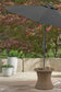 Laguna Heights Round End Table w/UMB OPT Signature Design by Ashley®