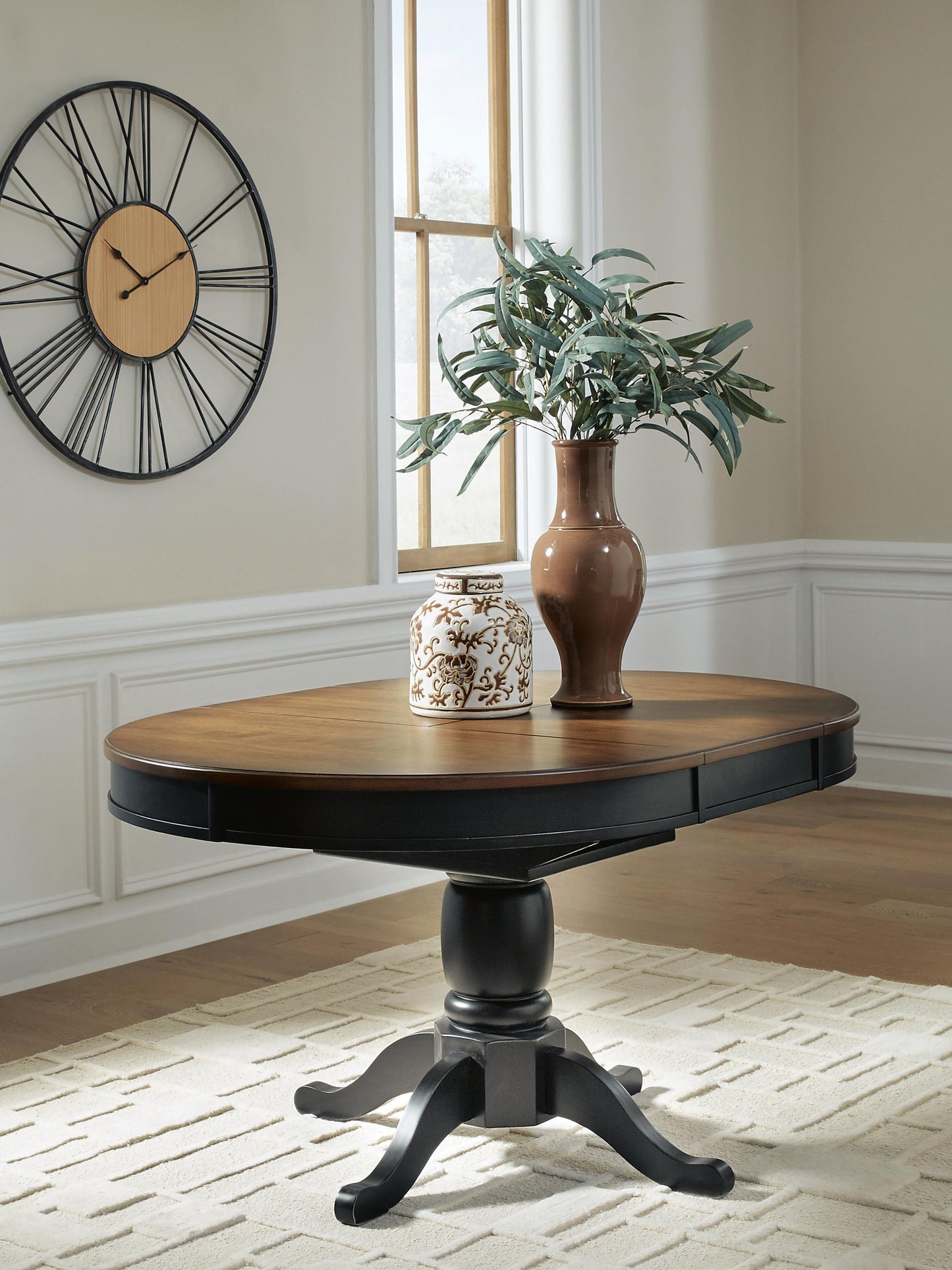 Clorazi Oval DRM Butterfly EXT Table Signature Design by Ashley®