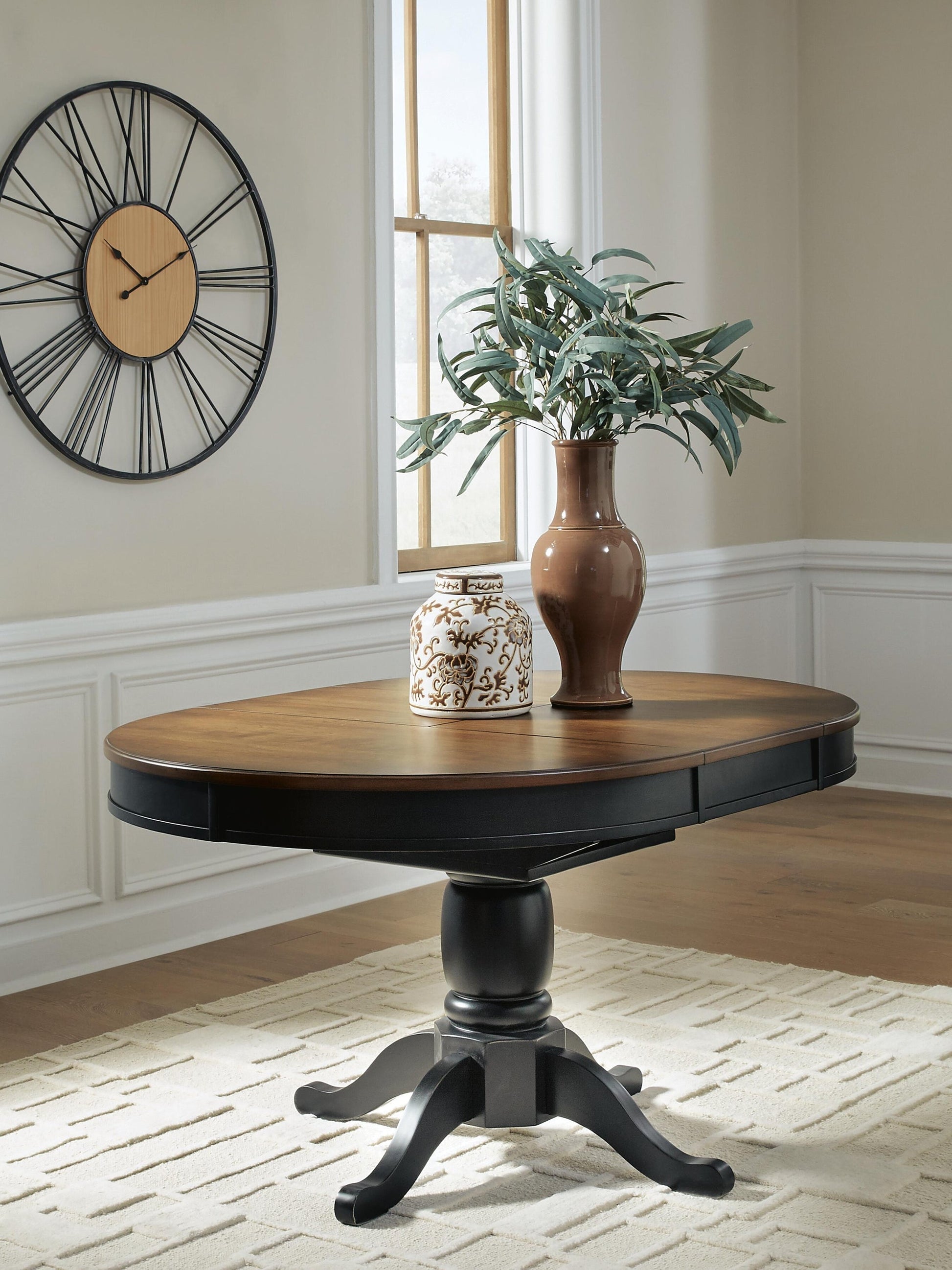 Clorazi Oval DRM Butterfly EXT Table Signature Design by Ashley®