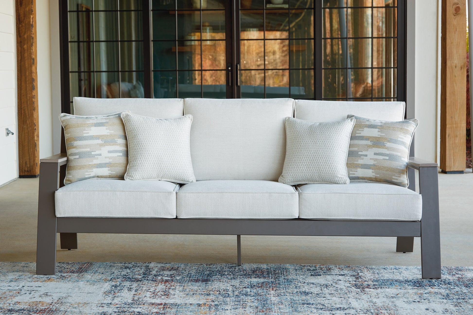 Tropicava Sofa with Cushion Signature Design by Ashley®