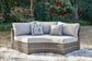 Harbor Court Curved Loveseat with Cushion Signature Design by Ashley®