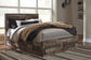 Derekson Queen Panel Bed with 6 Storage Drawers with Mirrored Dresser Benchcraft®