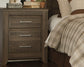 Juararo King Poster Bed with Mirrored Dresser, Chest and Nightstand Signature Design by Ashley®