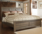 Juararo King Panel Bed with Mirrored Dresser Signature Design by Ashley®