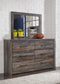 Drystan Queen Panel Bed with 2 Storage Drawers with Mirrored Dresser, Chest and Nightstand Signature Design by Ashley®
