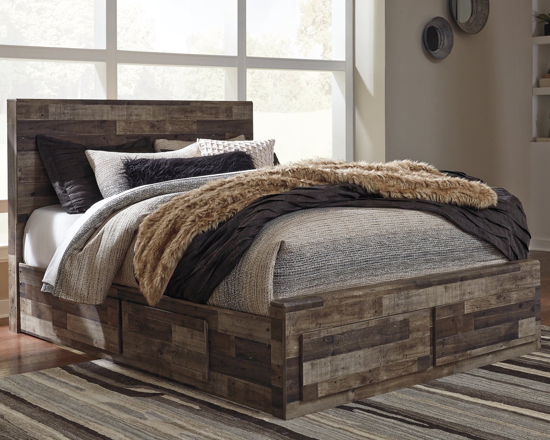 Derekson Queen Panel Bed with 4 Storage Drawers with Mirrored Dresser and Chest Benchcraft®