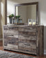 Derekson King Panel Headboard with Mirrored Dresser, Chest and Nightstand Benchcraft®
