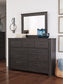 Brinxton King Panel Bed with Mirrored Dresser, Chest and 2 Nightstands Signature Design by Ashley®