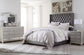 Coralayne Queen Upholstered Bed with Dresser Signature Design by Ashley®