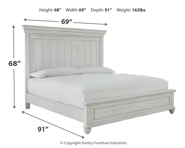 Kanwyn Queen Panel Bed with Mirrored Dresser and 2 Nightstands Benchcraft®