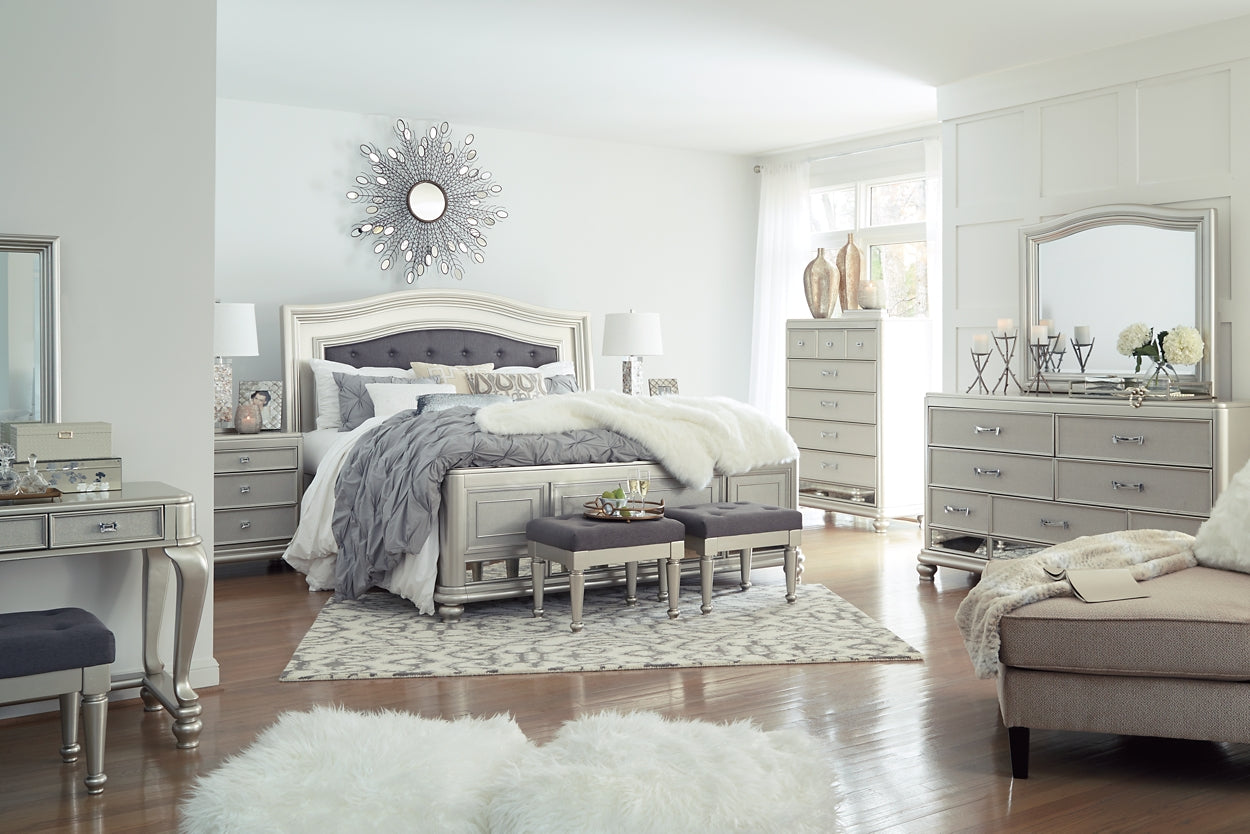 Coralayne California King Upholstered Sleigh Bed with Mirrored Dresser, Chest and Nightstand Signature Design by Ashley®