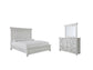 Kanwyn King Panel Bed with Mirrored Dresser Benchcraft®