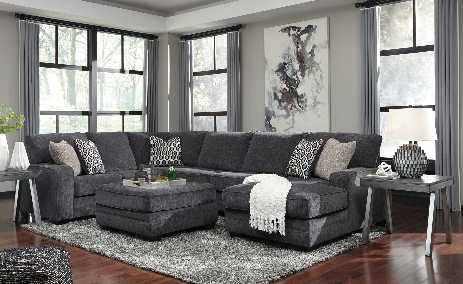 Tracling 3-Piece Sectional with Ottoman Benchcraft®