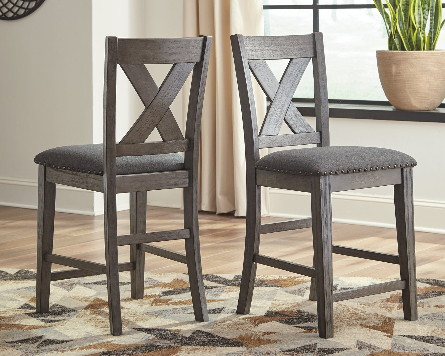 Caitbrook Counter Height Dining Table and 4 Barstools Signature Design by Ashley®