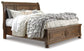 Flynnter Queen Sleigh Bed with 2 Storage Drawers with Mirrored Dresser Signature Design by Ashley®