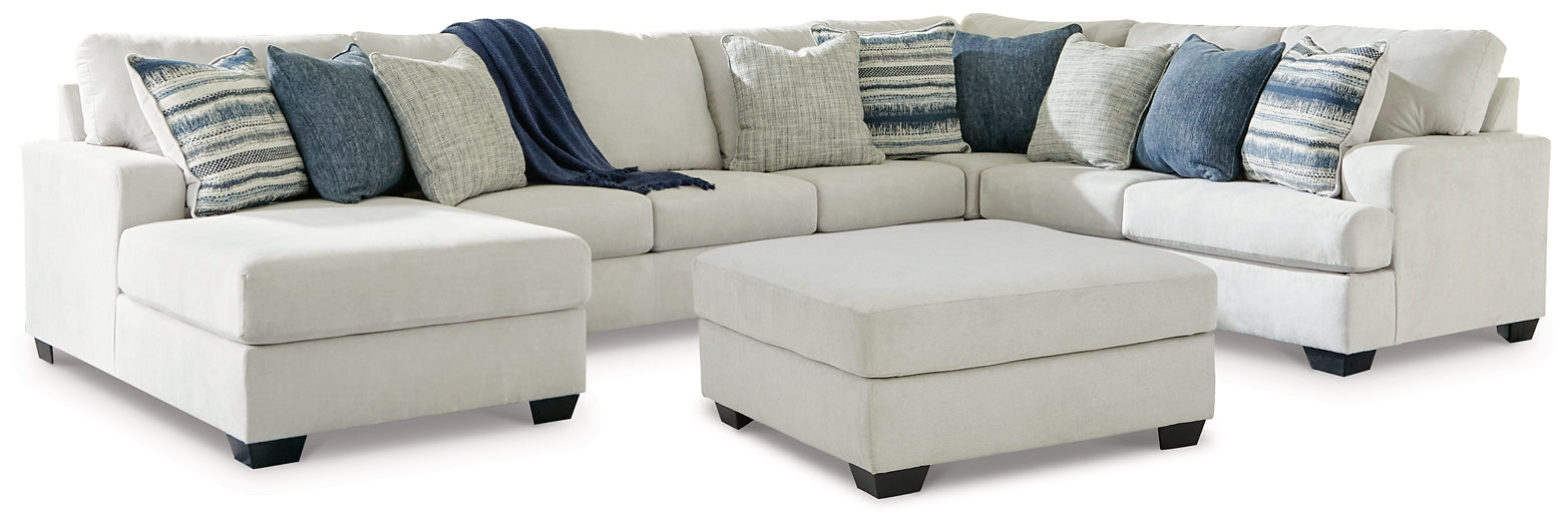 Lowder 4-Piece Sectional with Ottoman Benchcraft®