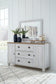 Haven Bay King Panel Storage Bed with Mirrored Dresser Signature Design by Ashley®