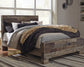 Derekson Queen Panel Bed with Mirrored Dresser and Nightstand Benchcraft®