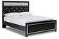 Kaydell Queen Upholstered Panel Bed with Mirrored Dresser and Chest Signature Design by Ashley®